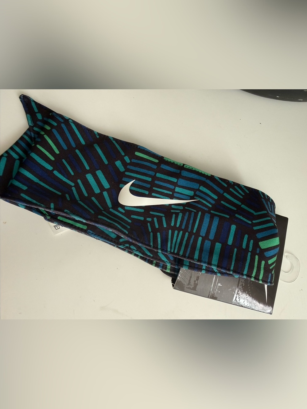 Nike Black Headband with Teal and Blue Pattern and White Swoosh